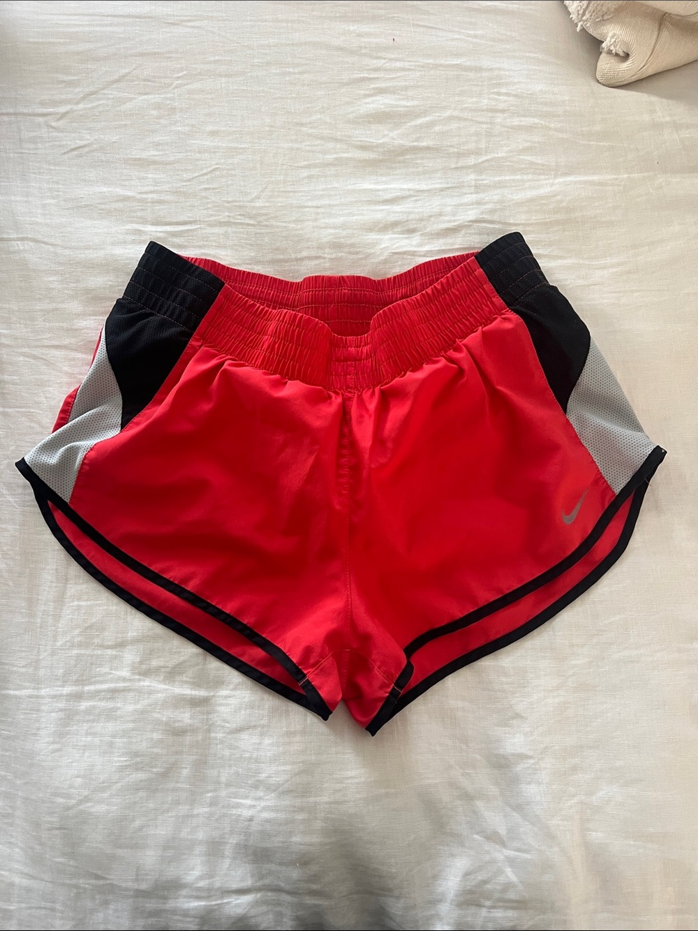 Nike Women's Red Athletic Shorts with Black & White Accents